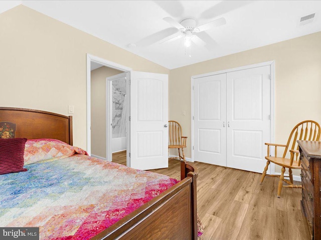 bedroom featuring visible vents, baseboards, ceiling fan, light wood-type flooring, and a closet