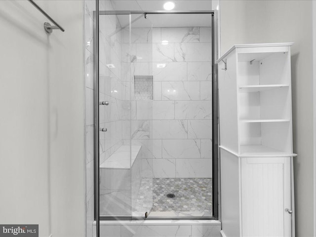 full bathroom with a stall shower