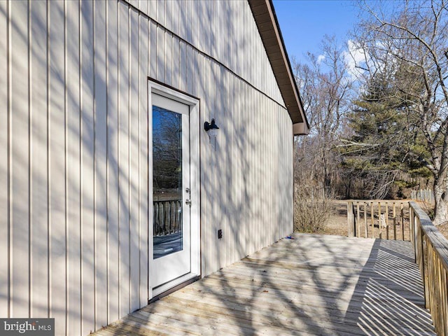 property entrance with a deck