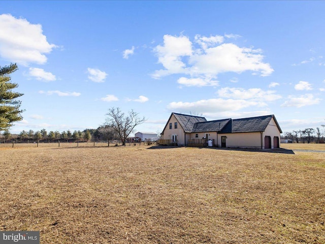 view of home's exterior with a lawn