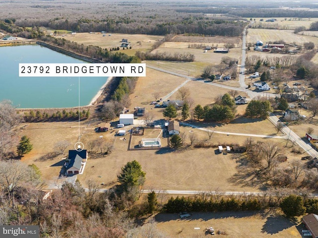 aerial view featuring a rural view and a water view