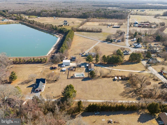 bird's eye view with a water view and a rural view