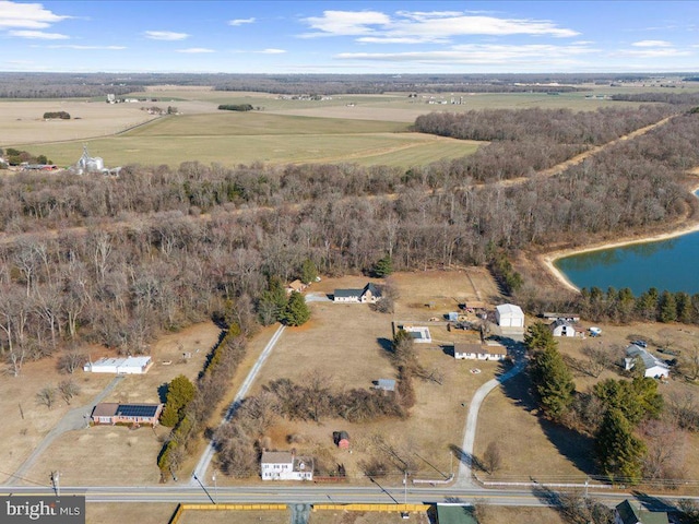 aerial view with a water view and a rural view