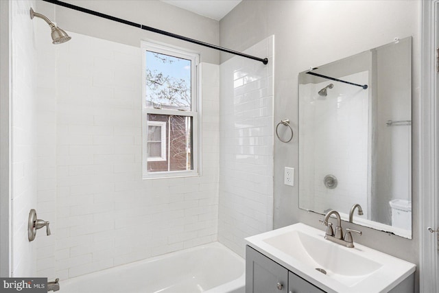 full bathroom featuring shower / bath combination and vanity