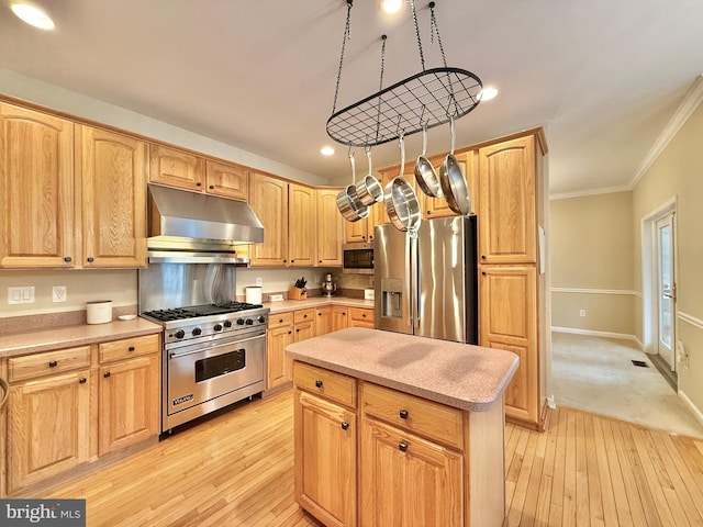 kitchen with stainless steel appliances, light brown cabinets, ornamental molding, and under cabinet range hood