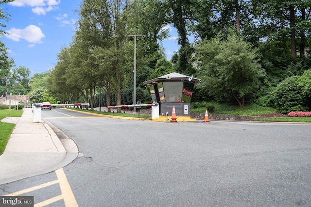 view of street with sidewalks and curbs