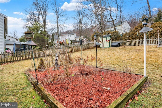 view of yard with fence