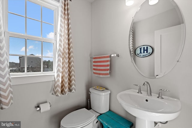 bathroom with a sink and toilet