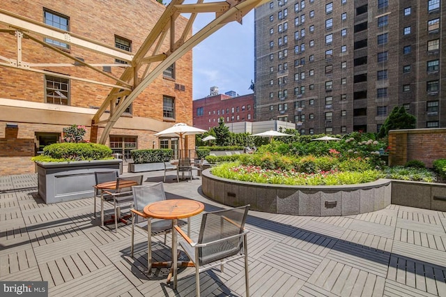 surrounding community featuring a patio area