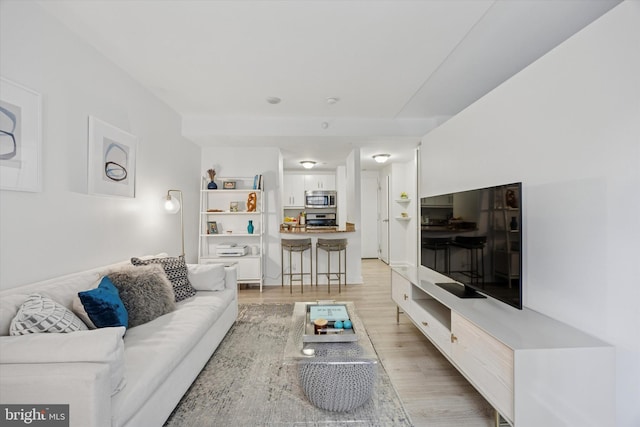 living area featuring light wood-type flooring