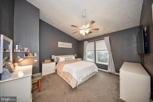 carpeted bedroom with a ceiling fan, baseboards, vaulted ceiling, and a textured ceiling