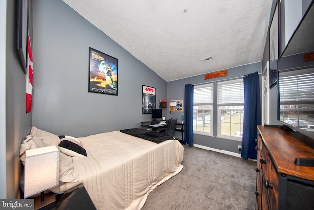 carpeted bedroom with visible vents, vaulted ceiling, a textured ceiling, and baseboards