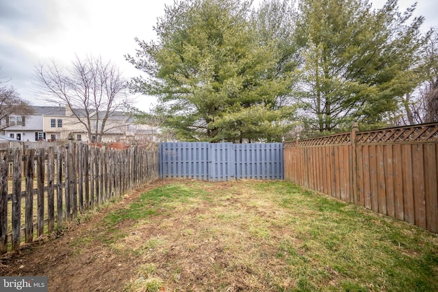 view of yard featuring a fenced backyard