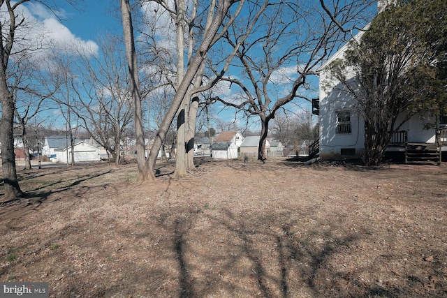 view of yard with a wooden deck