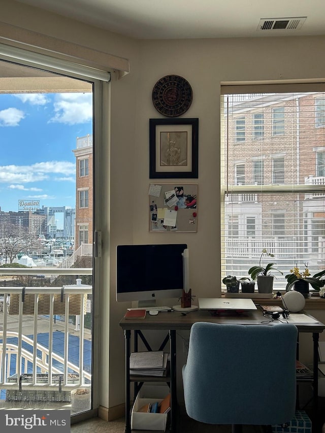 office area featuring visible vents