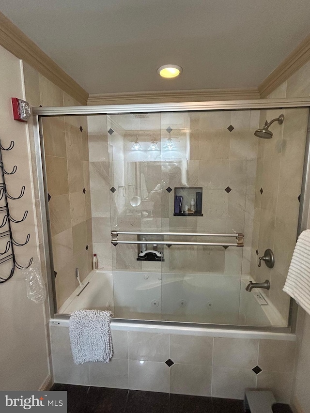 full bath featuring ornamental molding and tiled shower / bath combo