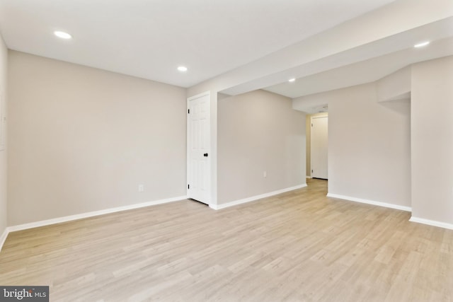 interior space featuring light wood-style flooring, recessed lighting, and baseboards