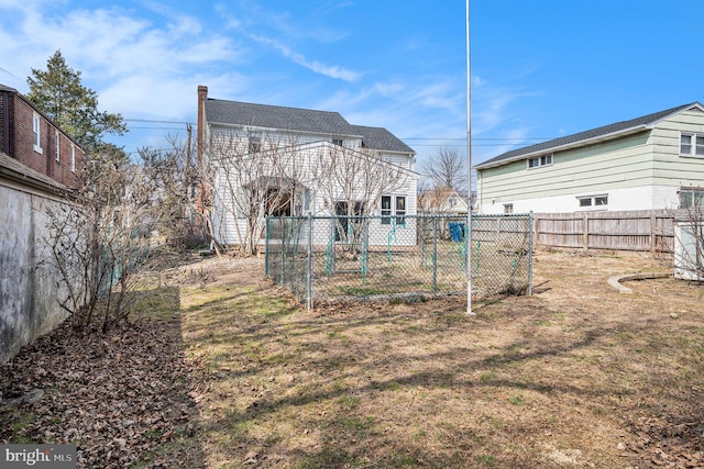 view of yard with a fenced backyard