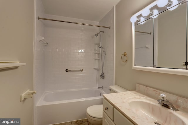 bathroom with vanity, toilet, and shower / washtub combination