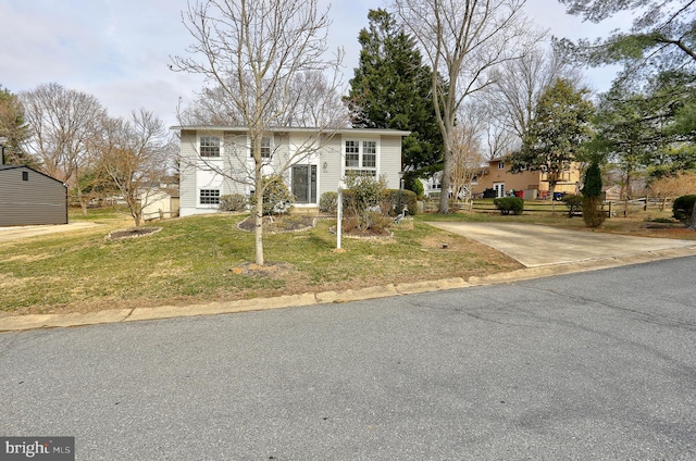 view of front of home with a front lawn