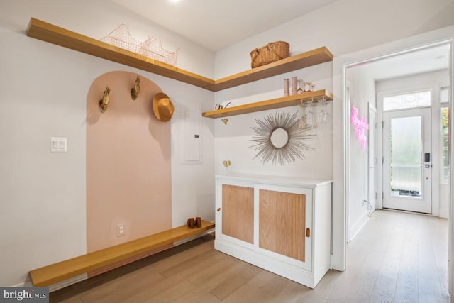 mudroom with wood finished floors