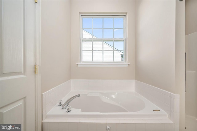 bathroom featuring a bath