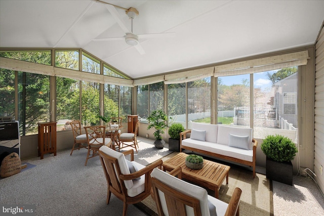 sunroom / solarium with an outdoor living space and a ceiling fan