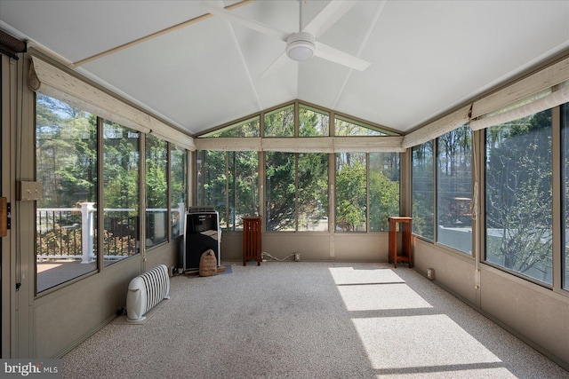 sunroom featuring a wealth of natural light and ceiling fan