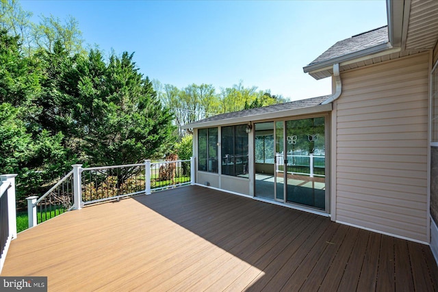 deck with a sunroom