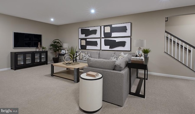 living room with recessed lighting, carpet flooring, stairway, and baseboards