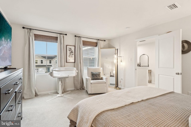 bedroom with light carpet, baseboards, and visible vents