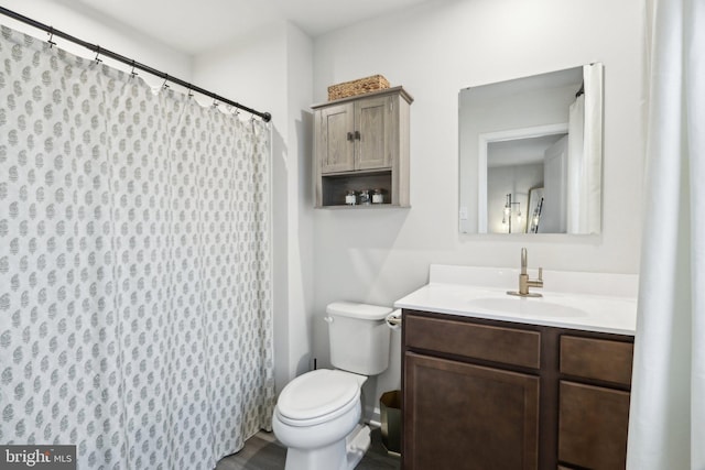 full bath with vanity and toilet