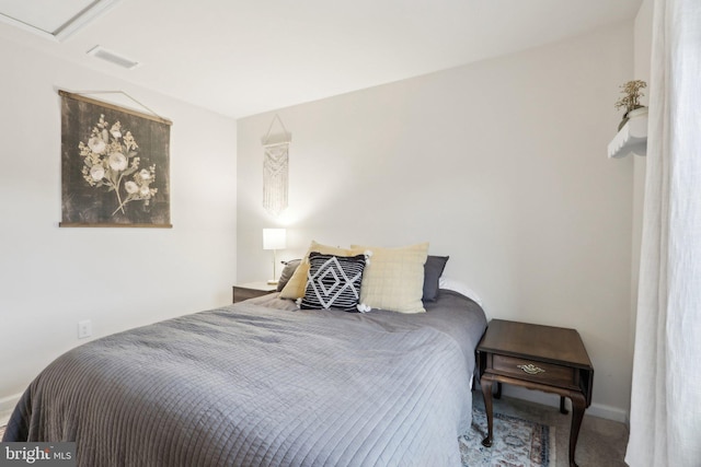 bedroom featuring carpet and visible vents