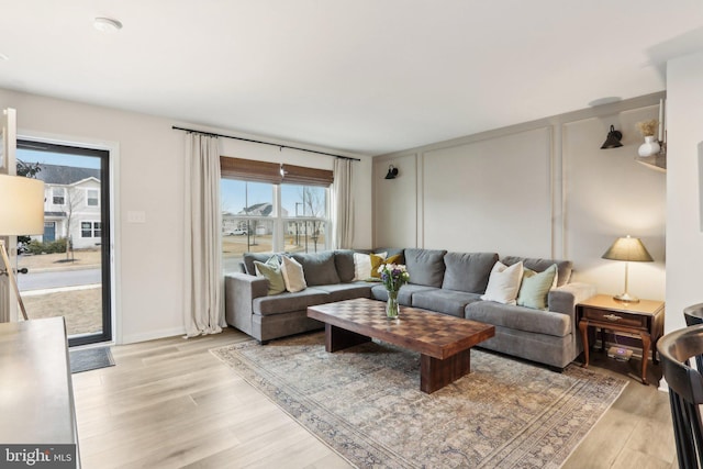 living area featuring light wood finished floors