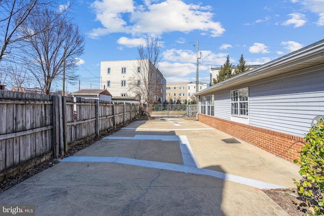 exterior space with a patio area and fence