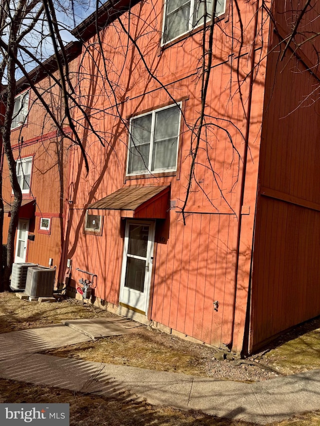 exterior space featuring central AC unit