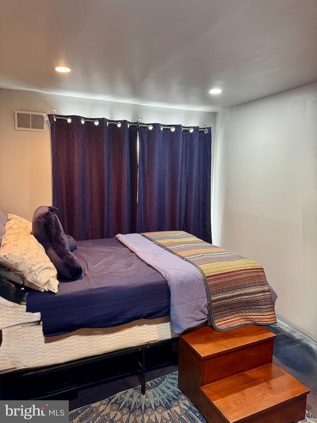 bedroom featuring recessed lighting and visible vents