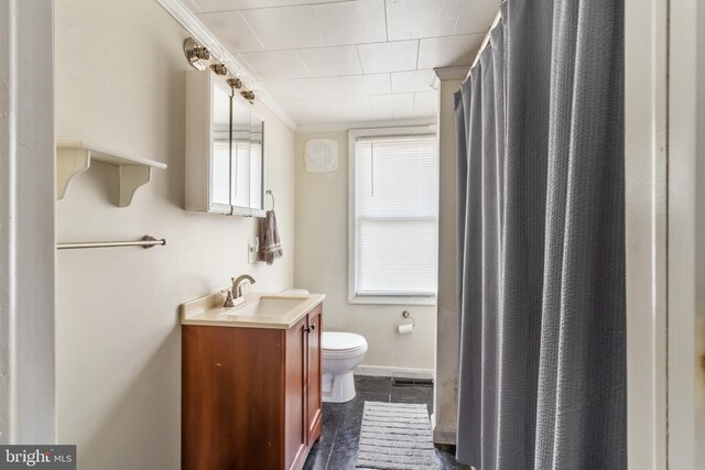 full bathroom with toilet, visible vents, vanity, baseboards, and crown molding