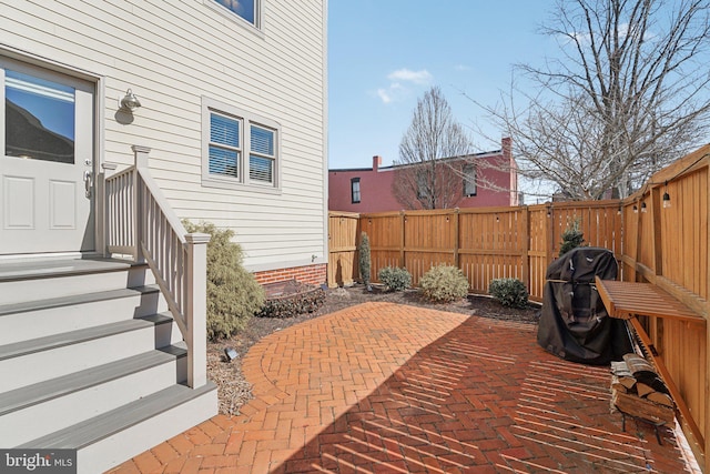 view of patio with fence