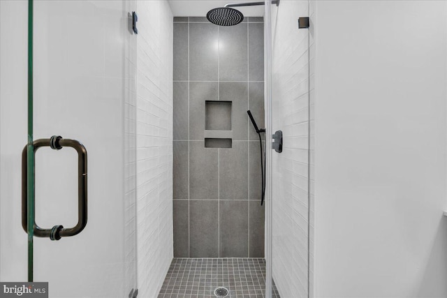 bathroom with a stall shower