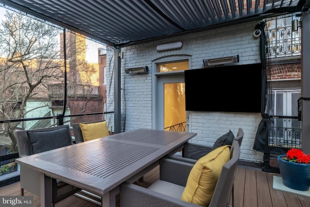 deck with outdoor dining space