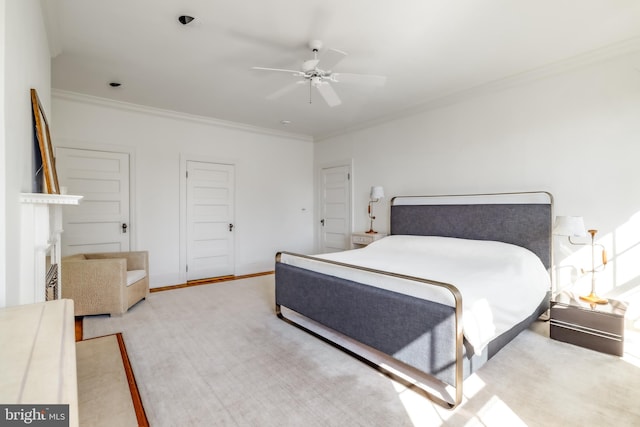 bedroom featuring crown molding, baseboards, a closet, and ceiling fan