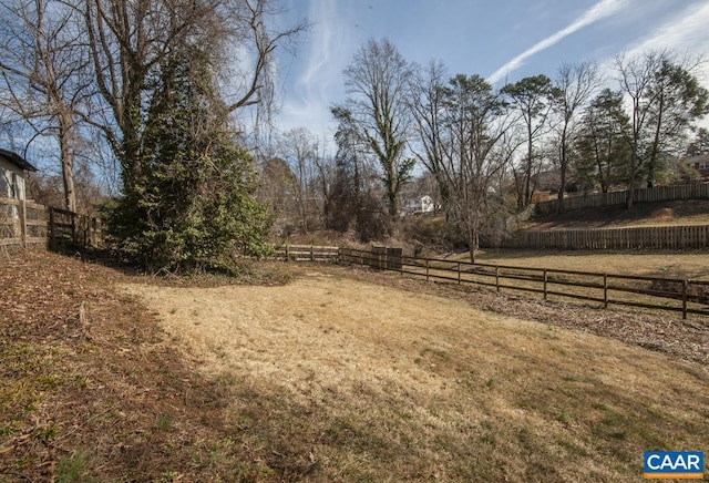 view of yard featuring fence