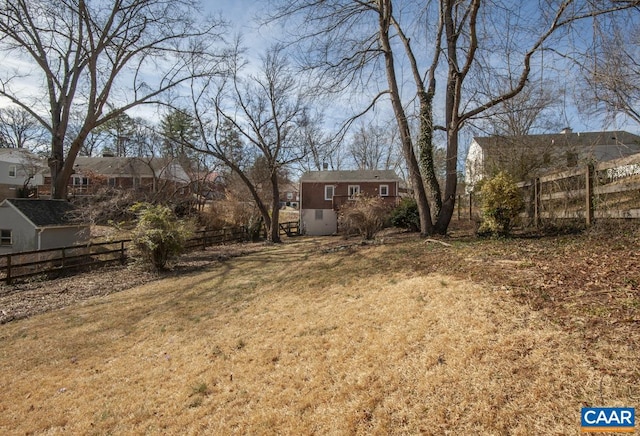 view of yard featuring fence