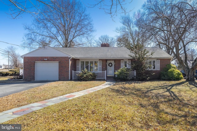 ranch-style home with covered porch, a garage, brick siding, driveway, and a chimney