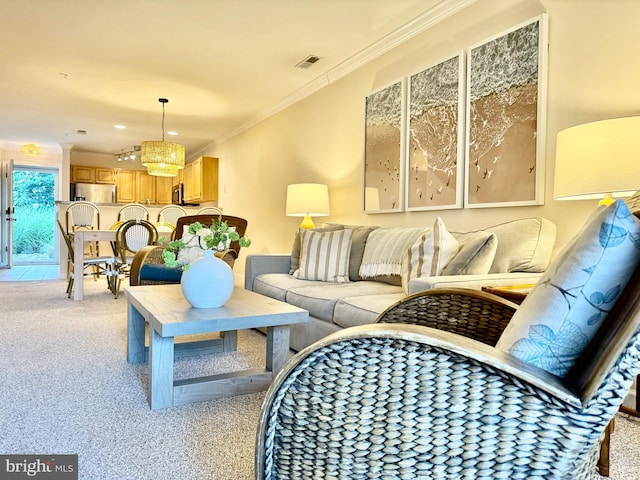 interior space featuring light carpet, visible vents, and ornamental molding