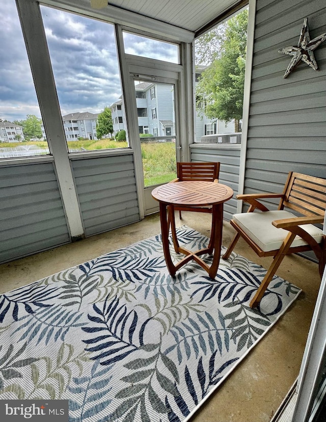 sunroom featuring plenty of natural light