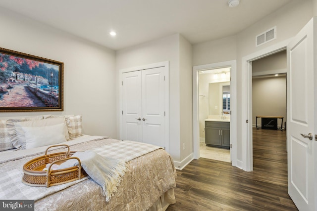 bedroom with recessed lighting, visible vents, baseboards, a closet, and dark wood finished floors