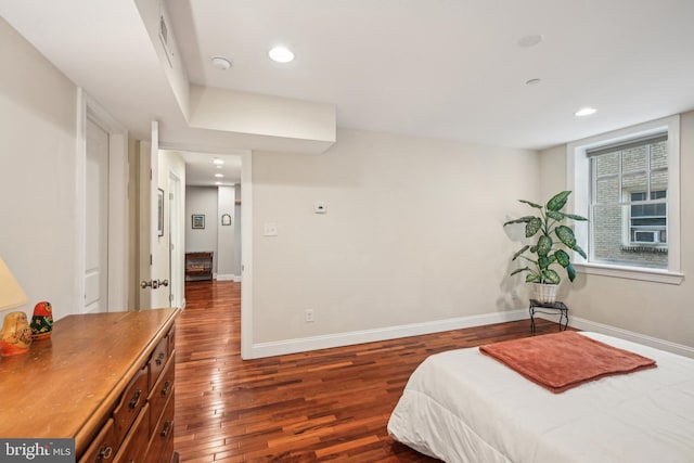 bedroom featuring recessed lighting, baseboards, and hardwood / wood-style floors