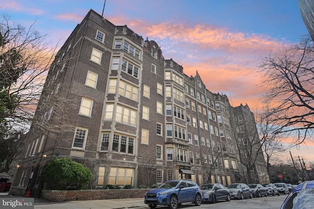 view of property at dusk